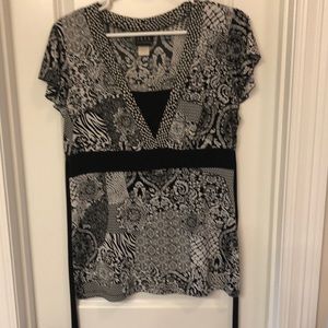 Flutter sleeve stretch knit top. Size L